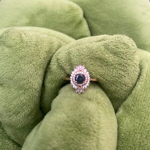 Rose gold with blue stone